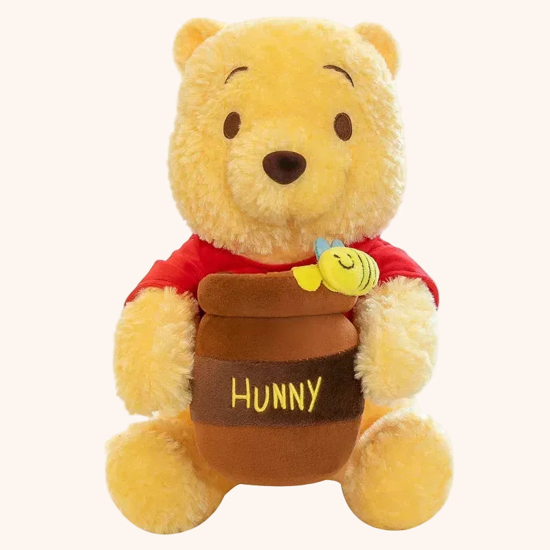 Peluche Winnie l’Ourson douce et câline pour enfants - Doudoria